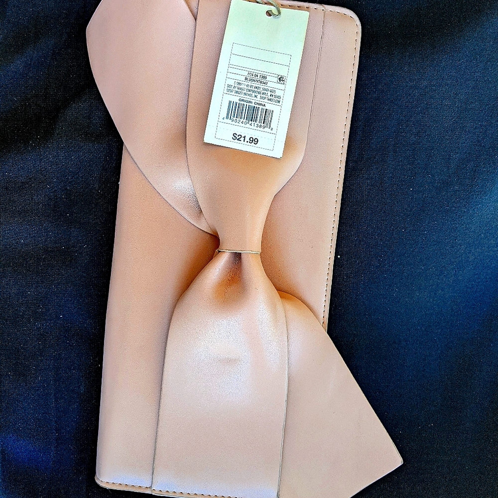 Peach colored clutch purse/wallet